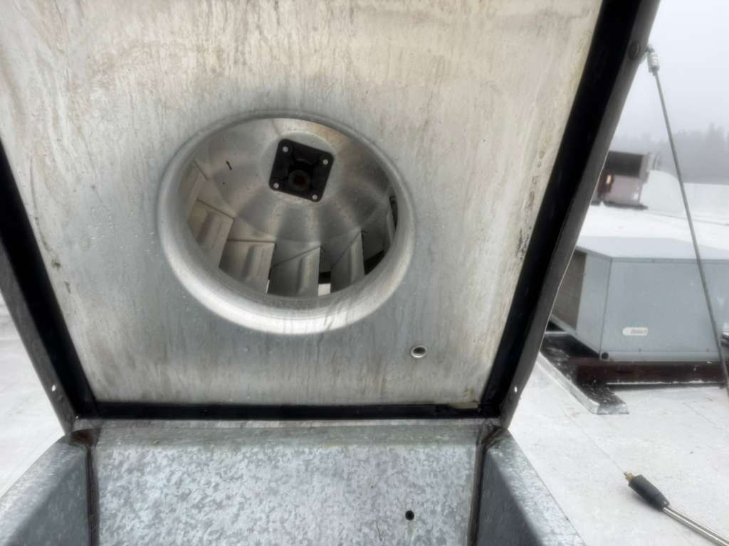Rooftop exhaust fan extractor cleaned and documented after AFS service