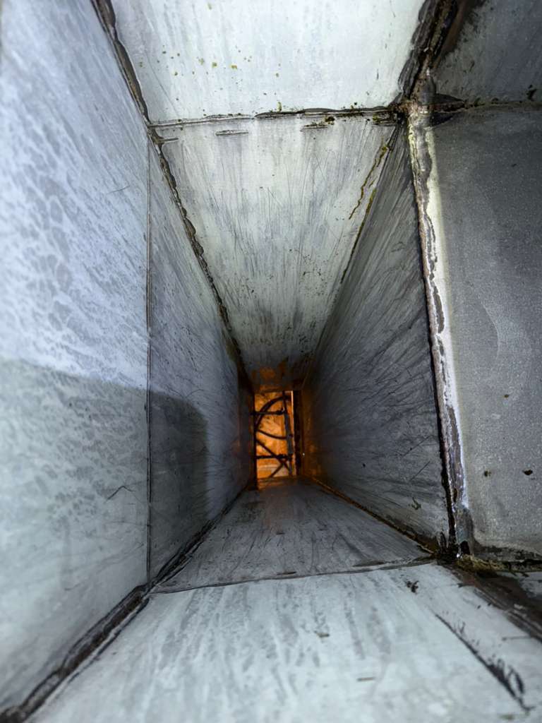 Kitchen exhaust flue section cleaned and cleared after AFS service